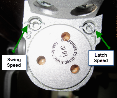 Picture of a door closer with the adjustment screws labeled for “Swing Speed’ and “Latch Speed”.